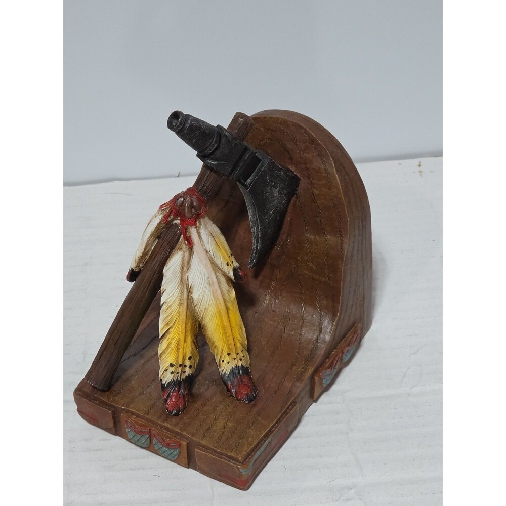 Vintage Trippies Native American style tomahawk and feather book end.